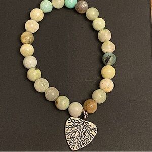 Amazonite 8mm Round Beaded Bracelet With Silver Shaped Heart & Expressive Vanes.